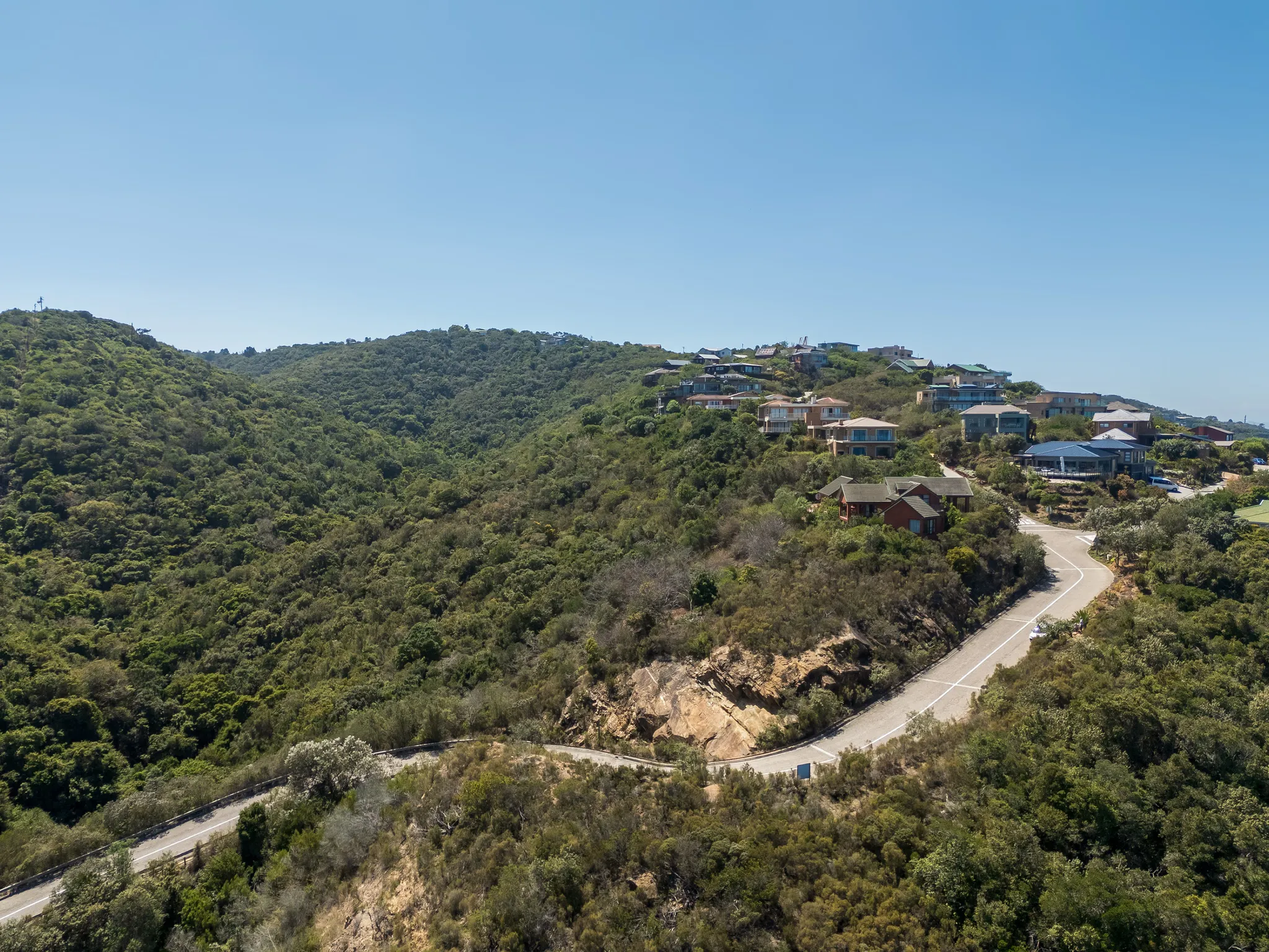 Aerial view over the fynbos hills of Wilderness, Garden Route