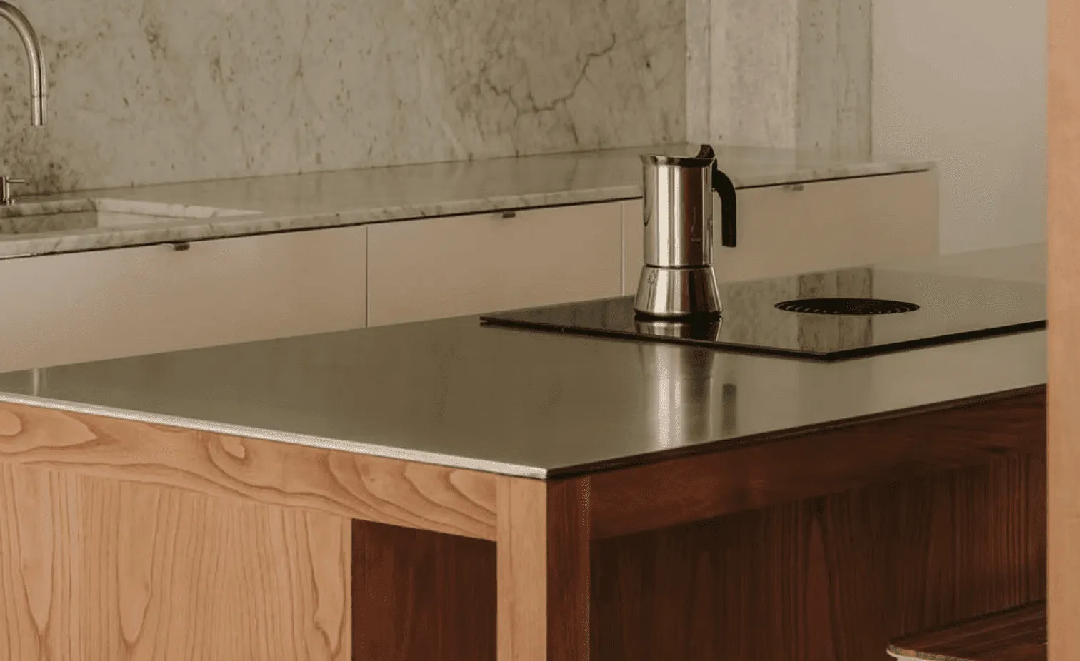 Stainless steel tops with oak cupboards
