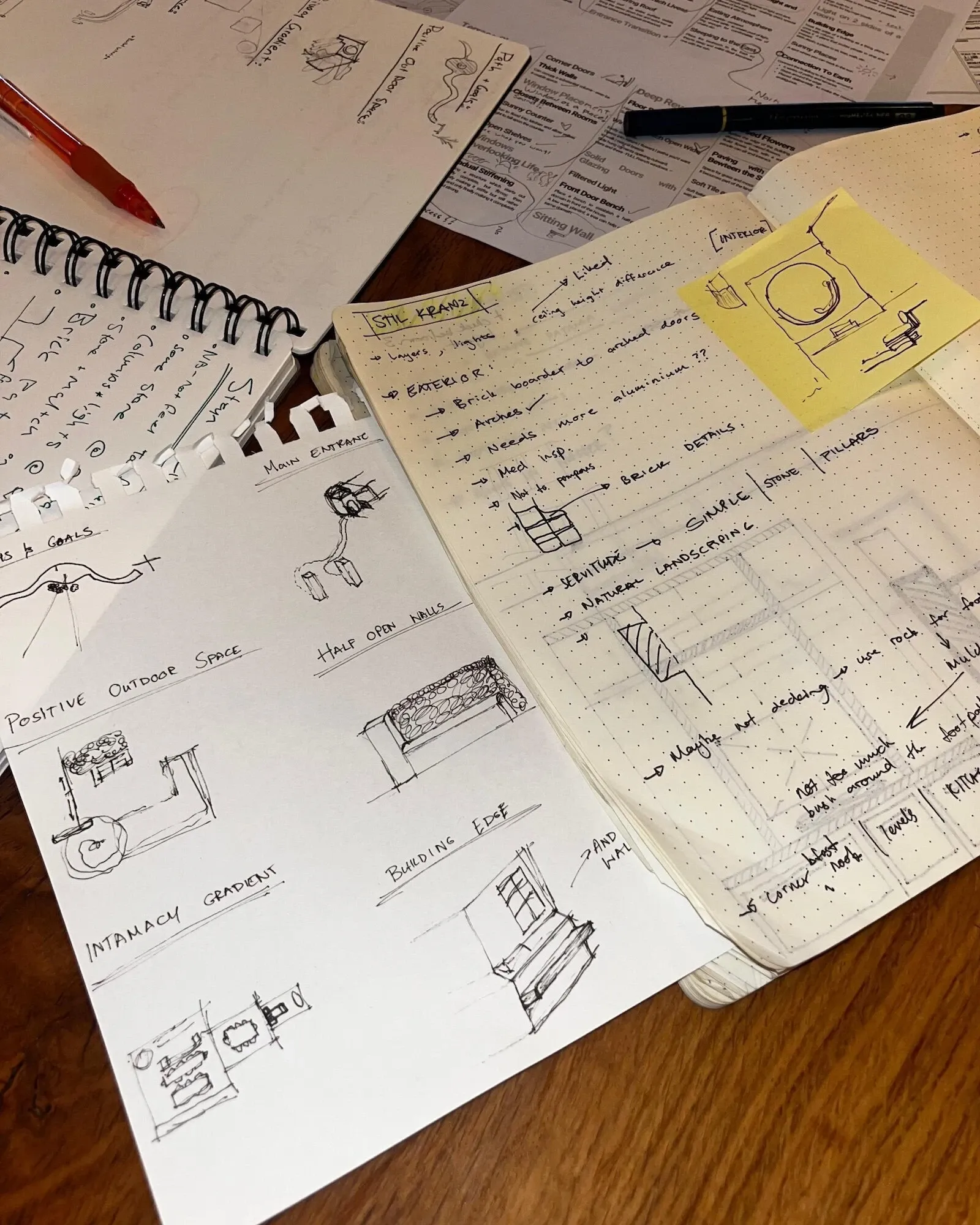 Notebooks with early pattern sketches